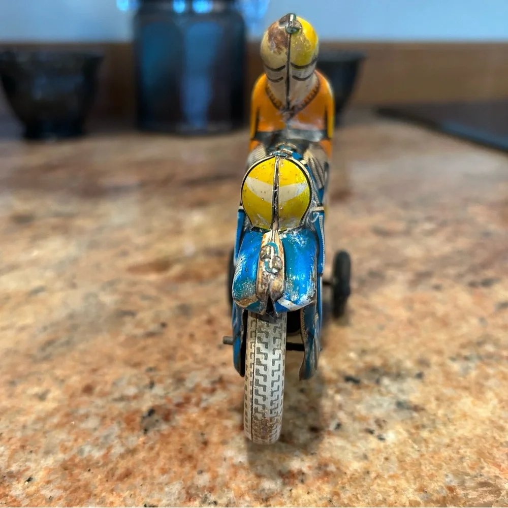 Tin Lithograph Friction Drive Ballon Cordatic toy cycle EN-12-63 Vtg 1950 Era.